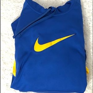 royal blue and yellow nike shirt